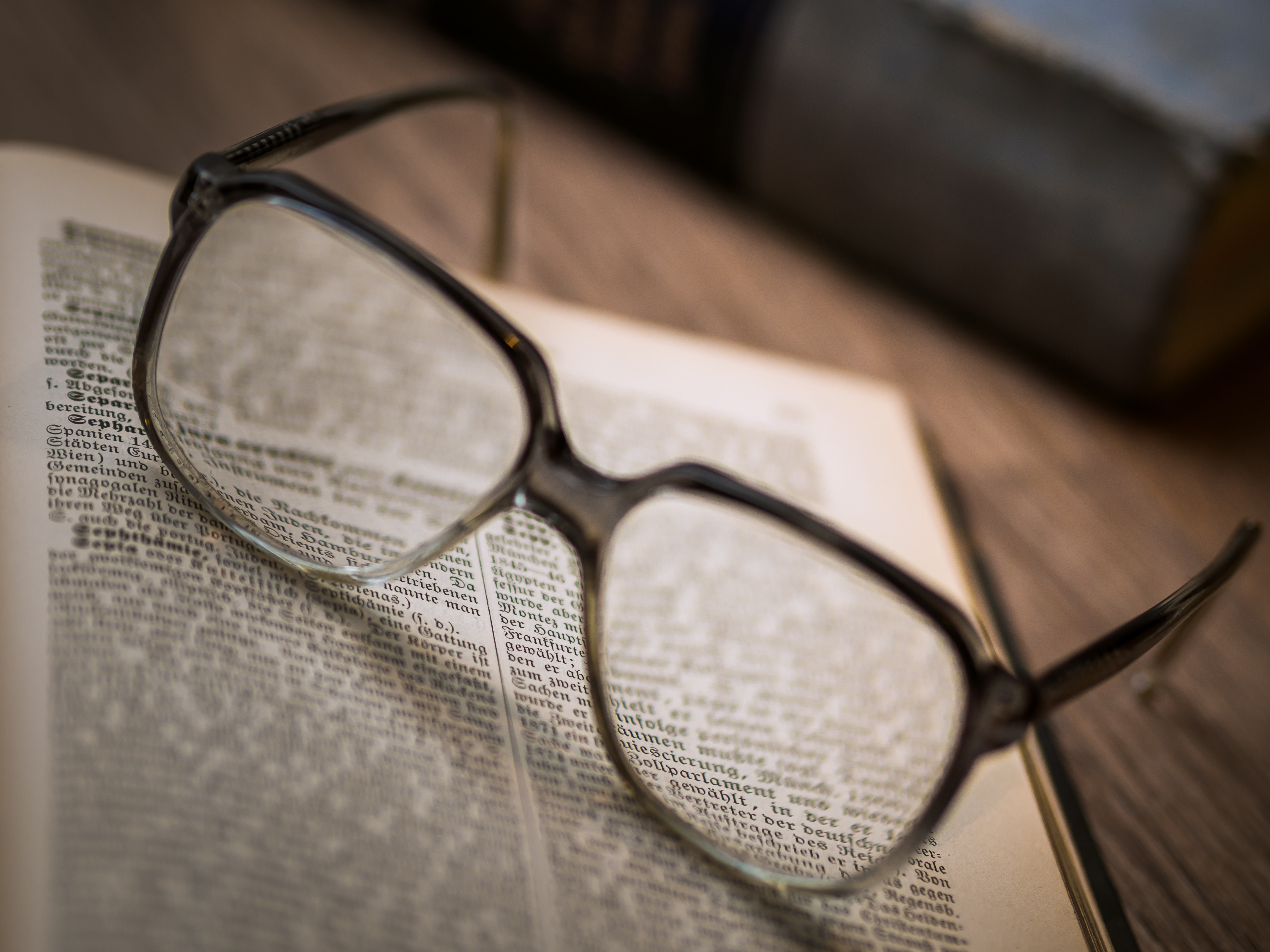 Reading glasses on book